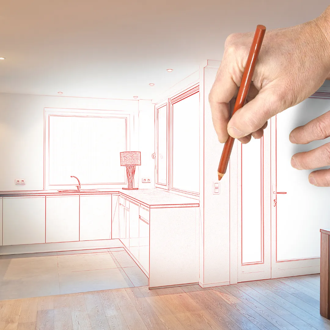 Χέρι αρχιτέκτονα σχεδιάζει σκαρίφημα κουζίνας πάνω σε υφιστάμενο χώρο